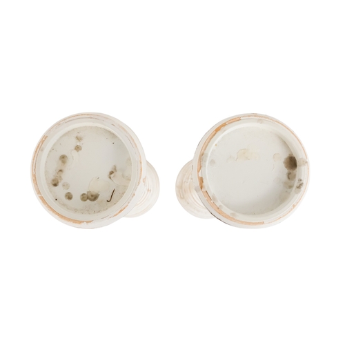 57 - A pair of contemporary church style candlesticks - of baluster form and painted white, 44cm high. (2... 