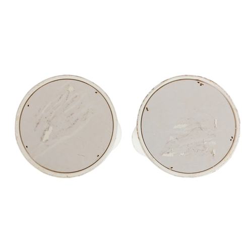 57 - A pair of contemporary church style candlesticks - of baluster form and painted white, 44cm high. (2... 