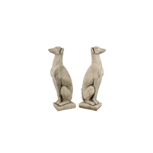 59 - A pair of reconstituted stone gate capitals - modelled as greyhounds, 56cm high.