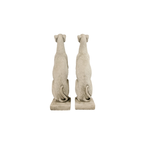 59 - A pair of reconstituted stone gate capitals - modelled as greyhounds, 56cm high.