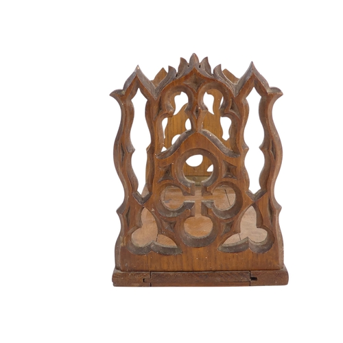 6 - A 19th century oak book slide - with hinged Gothic end-supports, 33 x 13cm (57cm extended).