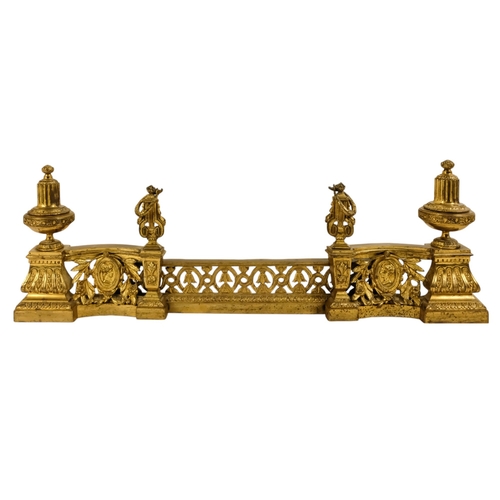 8 - A set of French 19th century gilt metal chenets - together with fender rail, the chenets with classi... 