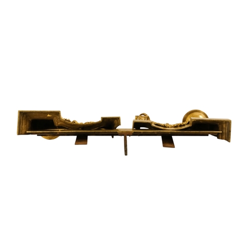8 - A set of French 19th century gilt metal chenets - together with fender rail, the chenets with classi... 