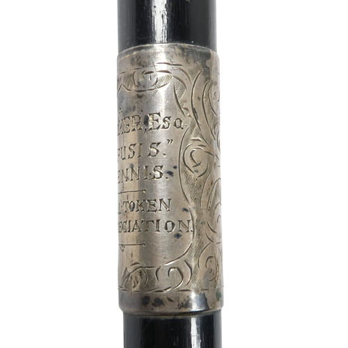 9 - An ebonised baton - London 1927, with silver foliate engraved mounts including presentation inscript... 