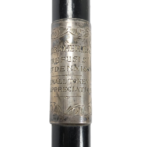 9 - An ebonised baton - London 1927, with silver foliate engraved mounts including presentation inscript... 