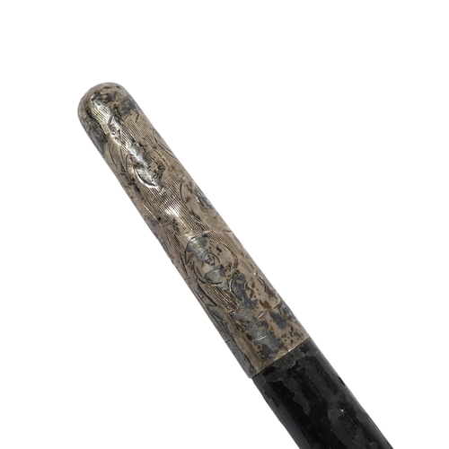 9 - An ebonised baton - London 1927, with silver foliate engraved mounts including presentation inscript... 