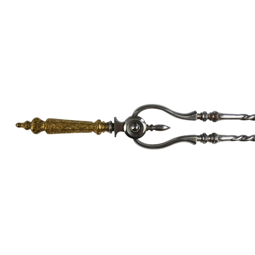 10 - A set of three George III style steel and brass fire tools - of spiral twist form, comprising tongs,... 