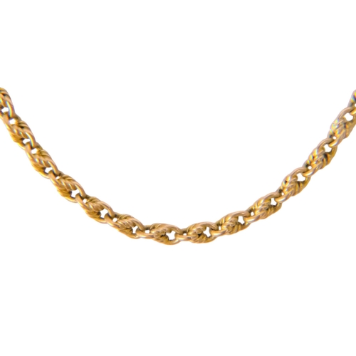 603 - A yellow metal fancy link muff chain - with a 9ct gold clasp, 145cm long, 25.3g.