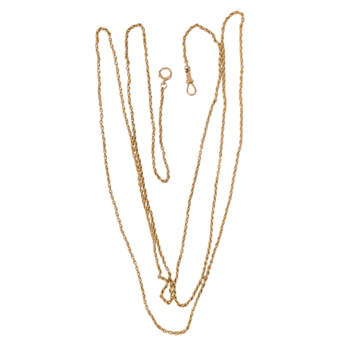603 - A yellow metal fancy link muff chain - with a 9ct gold clasp, 145cm long, 25.3g.
