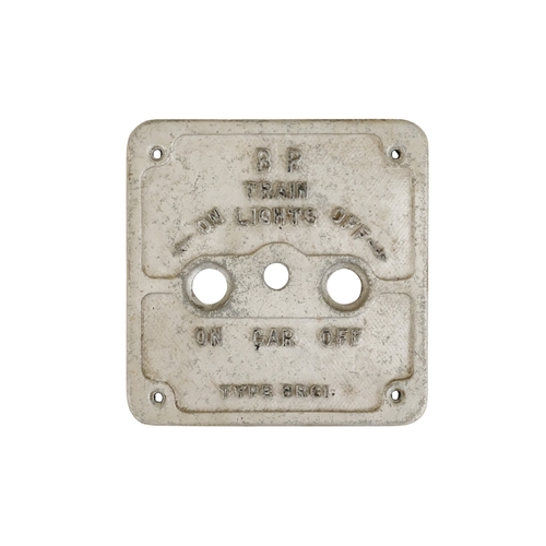 73 - A British Rail cast aluminium carriage lights switch - of square form, together with three further s... 