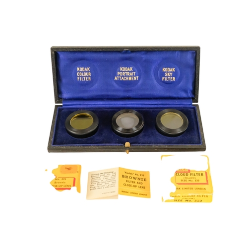 84 - A Kodak Beau Brownie - brown cased, together with a quantity of other photographic equipment. (qty)