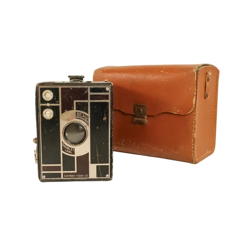 84 - A Kodak Beau Brownie - brown cased, together with a quantity of other photographic equipment. (qty)