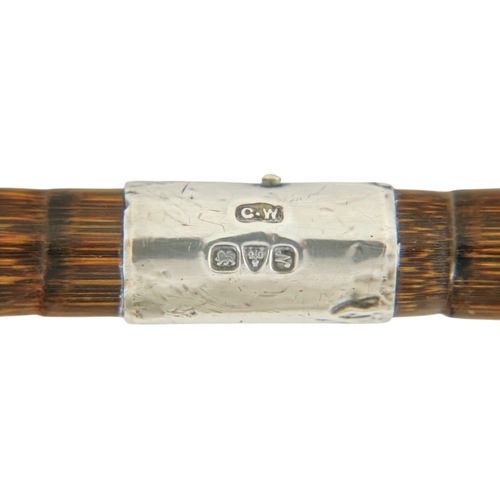 86 - An early 20th century partridge wood walking cane - Chester 1913, with silver mounts and modelled as... 