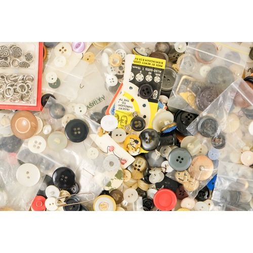 92 - A quantity of 20th century buttons.
