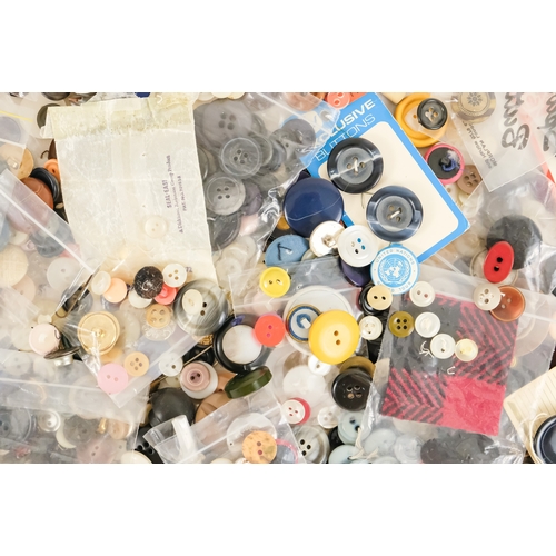 92 - A quantity of 20th century buttons.