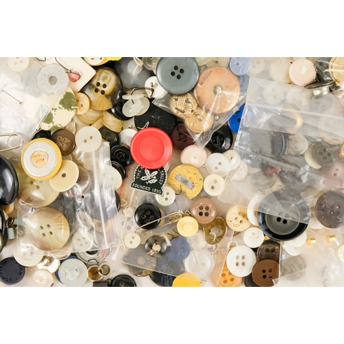 92 - A quantity of 20th century buttons.