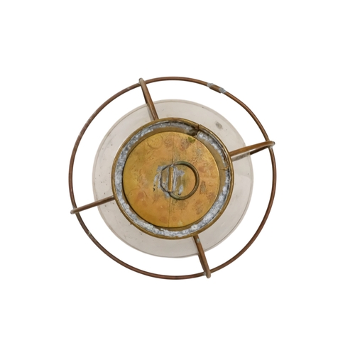 103 - An early 20th century brass anchor light - with clear glass, 32cm high.