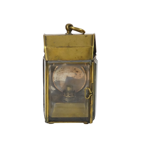 107 - A 19th century brass light - now converted for electricity with chamfered clear glass panels and a r... 
