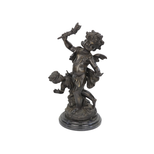 110 - A bronze figure of a cherub - blindfolded and holding a torch, 43cm high.