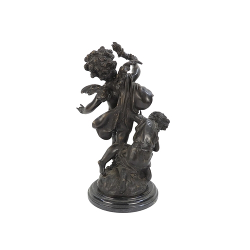 110 - A bronze figure of a cherub - blindfolded and holding a torch, 43cm high.
