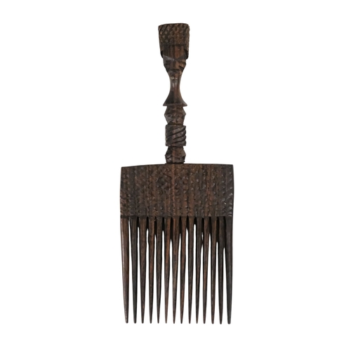 116 - Two African hardwood combs - each carved with a head to the handle, together with a rectangular carv... 