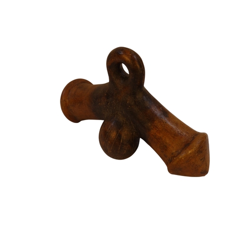 117 - A terracotta phallus - 29cm long.