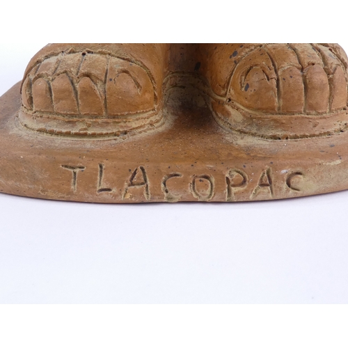 143 - A terracotta figure of an Aztec warrior - holding shield and club, 36cm high, together with an Aztec... 