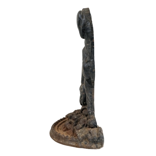 17 - A cast iron doorstop - modelled in the form of a hunting dog, 33cm high.