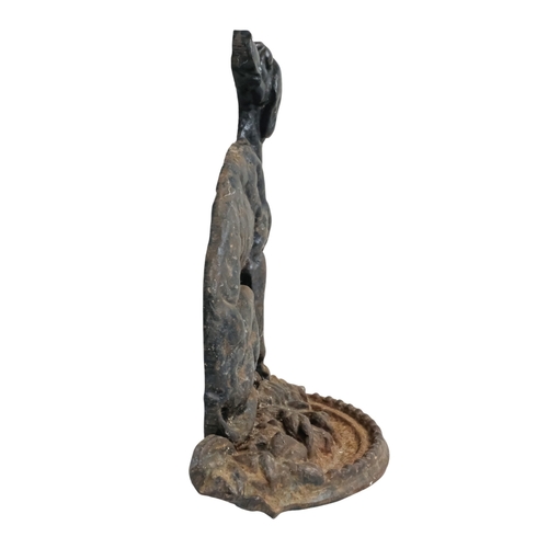 17 - A cast iron doorstop - modelled in the form of a hunting dog, 33cm high.
