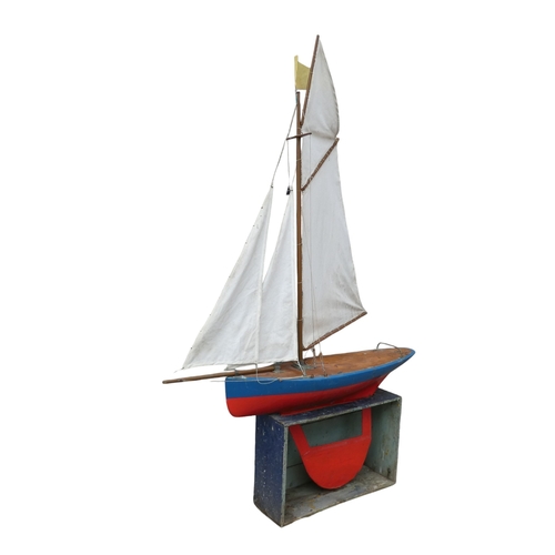 2 - An early 20th century pond yacht 'Queen Meg'- scratch built gaff rigged sloop, with a blue hull, red... 