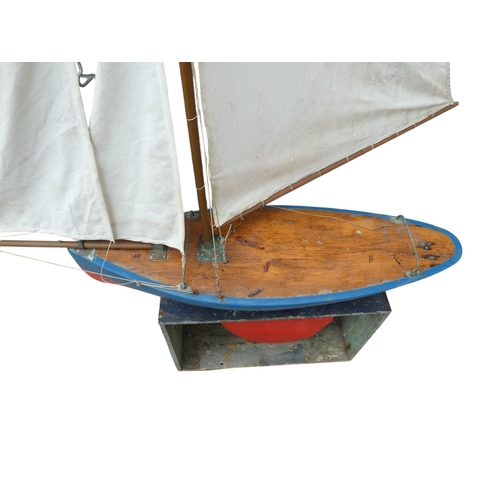 2 - An early 20th century pond yacht 'Queen Meg'- scratch built gaff rigged sloop, with a blue hull, red... 