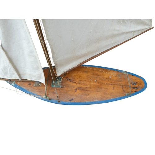 2 - An early 20th century pond yacht 'Queen Meg'- scratch built gaff rigged sloop, with a blue hull, red... 