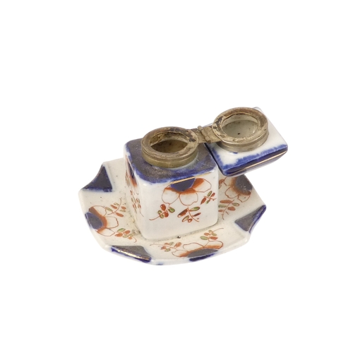 202 - A pair of Royal Crown Derby jugs - of squat form and decorated in the Imari style, marks to base, 13... 