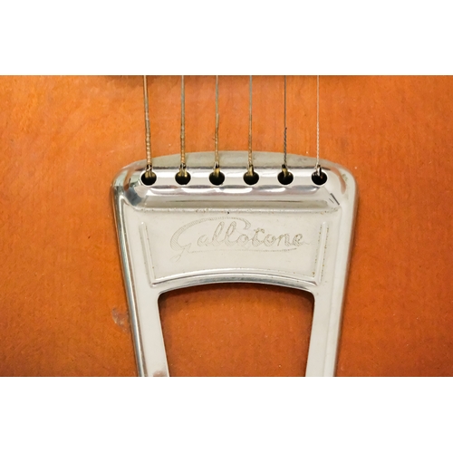 31 - A Gallotone Champion guitar - circa 1957, with a sunburst finish, including original headstock, badg... 
