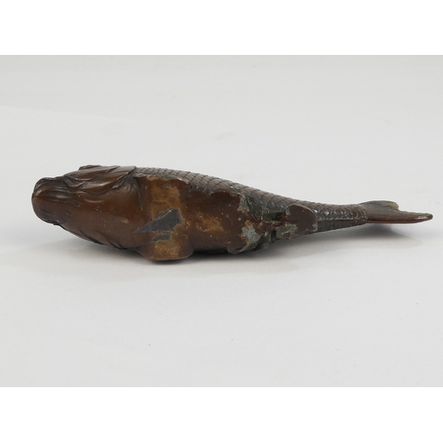 41 - A cast metal carp - with a bronzed finish, 9cm long.