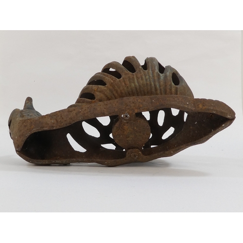 45 - A cast iron snail candle holder - height 15cm, length 28cm.