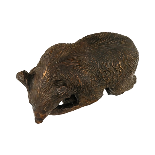 57 - A Black Forest model of a bear with a salmon - width 38cm, height 25cm.