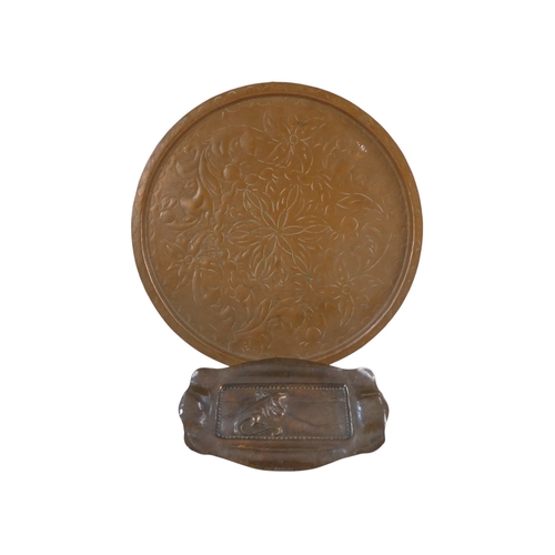 62 - A copper repousse rectangular tray - decorated with a lizard, 21cm wide, together with another circu... 