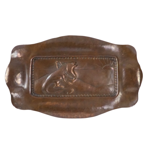 62 - A copper repousse rectangular tray - decorated with a lizard, 21cm wide, together with another circu... 