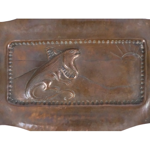 62 - A copper repousse rectangular tray - decorated with a lizard, 21cm wide, together with another circu... 