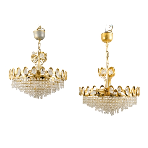 64 - A pair of 1970s chandeliers.