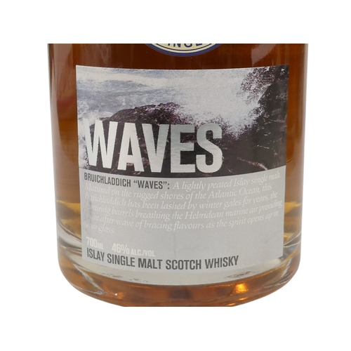 67 - A bottle of Bruichladdich Ilay single malt whisky - 70cl, 'Waves' in presentation tin, together with... 