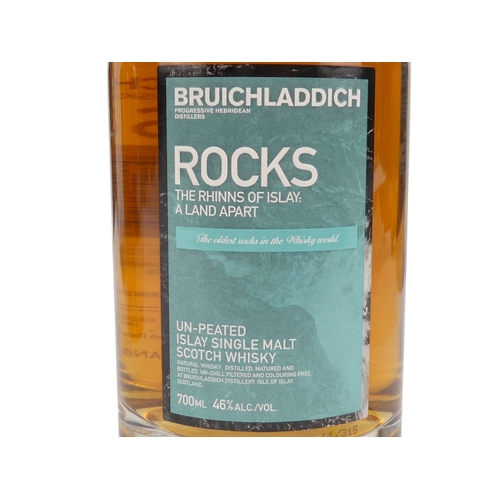 67 - A bottle of Bruichladdich Ilay single malt whisky - 70cl, 'Waves' in presentation tin, together with... 