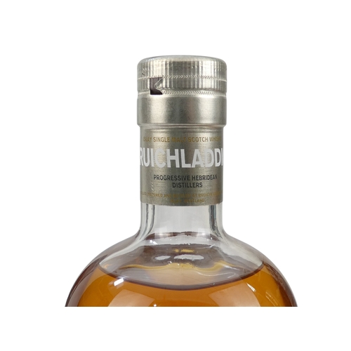 67 - A bottle of Bruichladdich Ilay single malt whisky - 70cl, 'Waves' in presentation tin, together with... 