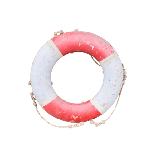71 - A life buoy ring with red and white decoration and rope grab lines - diameter 74cm, together with an... 