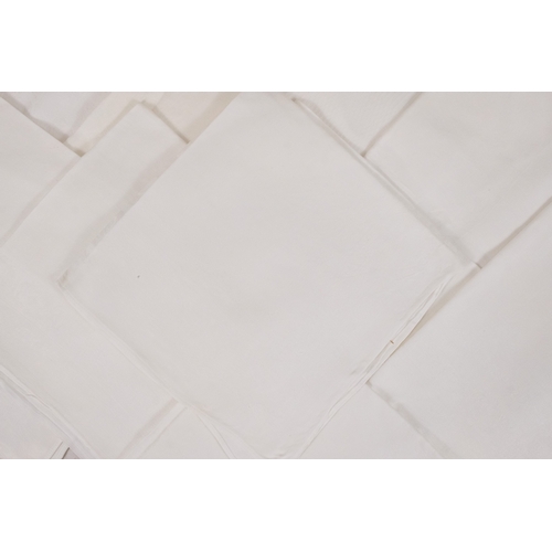 73 - Ten various white damask napkins.