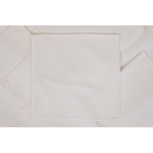 73 - Ten various white damask napkins.