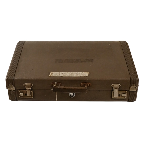 74 - A Hohner piano accordion - Carena IIIM, with a red marbled case and a grey carry case.