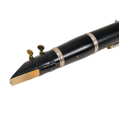 77 - A Boosey & Hawkes clarinet, boxed.
