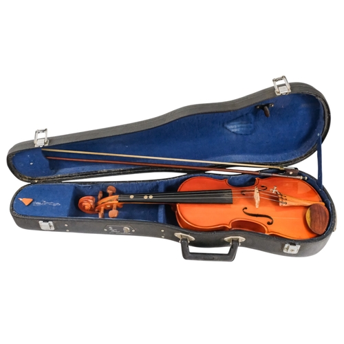 81 - A child's violin, length of back 31cm - with box, cased.